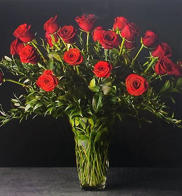 Two Dozen Red Long-Stemmed Roses In a Vase